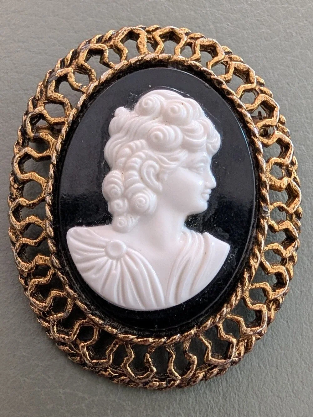 Classic Black and White Cameo Brooch with Gold Frame